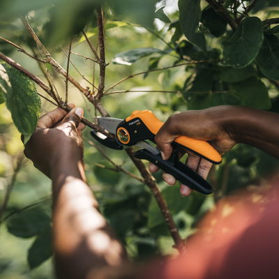 Schere 'Plus PowerLever', schwarz/orange Schere 'Plus PowerLever', schwarz/orange