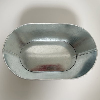 'Danke' - Dipladenien 'Qdeville®' rosa in Zinkschale