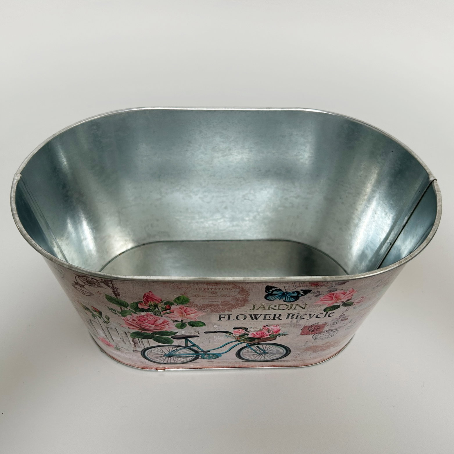 'Danke' - Dipladenien 'Qdeville®' rosa in Zinkschale