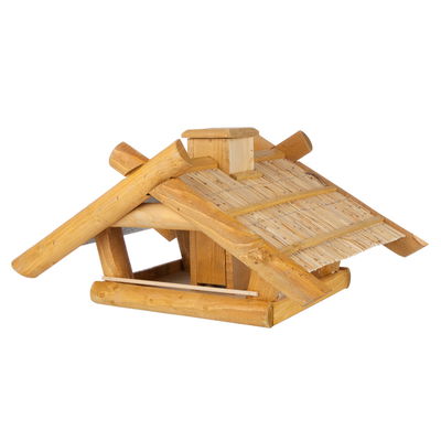 Vogelhaus mit Strohdach und Futterkamin Vogelhaus mit Strohdach und Futterkamin