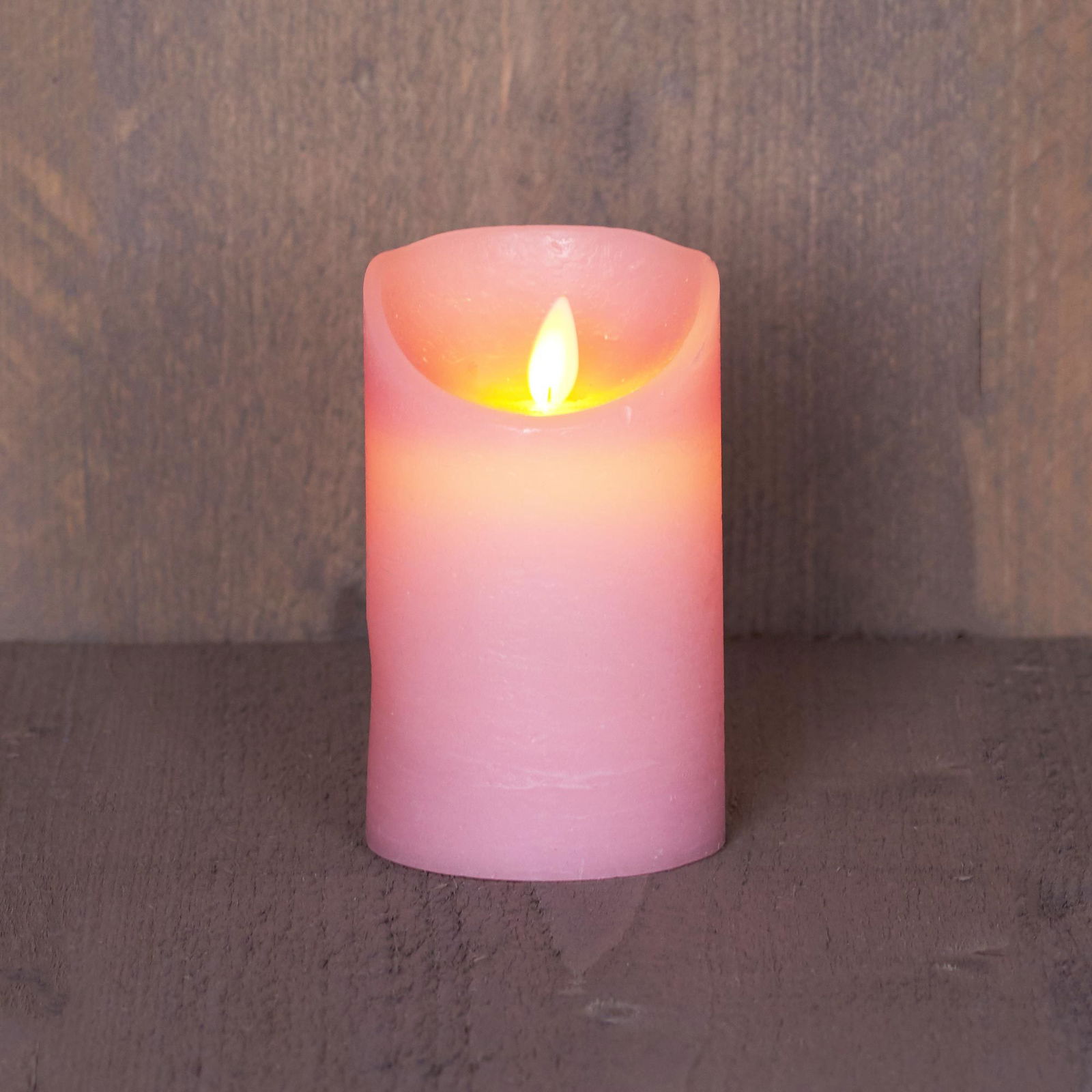 LED Echtwachskerze 'Magic Flame', rosa, Ø 7,5 x H 12,5 cm LED Echtwachskerze 'Magic Flame', rosa, Ø 7,5 x H 12,5 cm