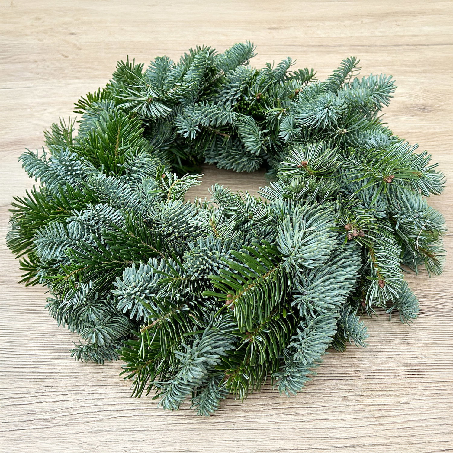 Adventskranz, Mixgrün, halbrund gebunden, ca. 30 cm Ø Adventskranz, Mixgrün, halbrund gebunden, ca. 30 cm Ø