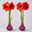 Amaryllis in Wachs XL, Dekor 'Rot-Violett gestreift', Blüte rot, 2 Pflanzen Amaryllis in Wachs XL, Dekor 'Rot-Violett gestreift', Blüte rot, 2 Pflanzen
