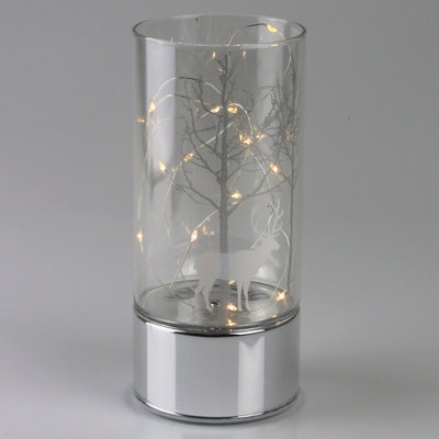 LED Windlicht mit kleinen Bäumen, weiß, ca. Ø 9 x H 15 cm LED Windlicht mit kleinen Bäumen, weiß, ca. Ø 9 x H 15 cm