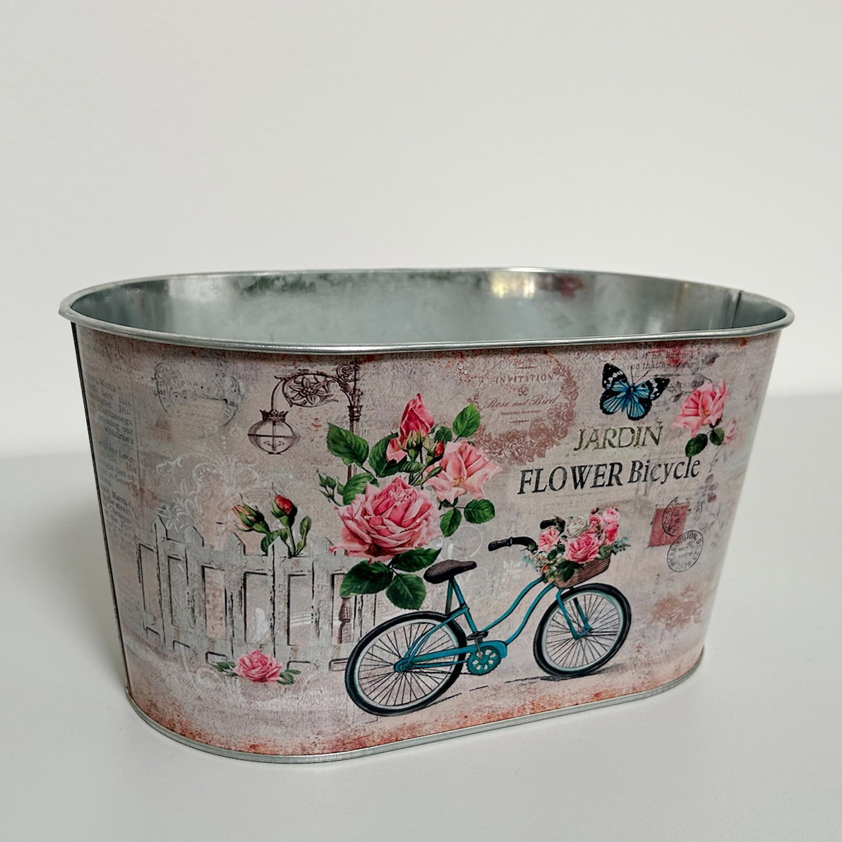 'Danke' - Dipladenien 'Qdeville®' rosa in Zinkschale